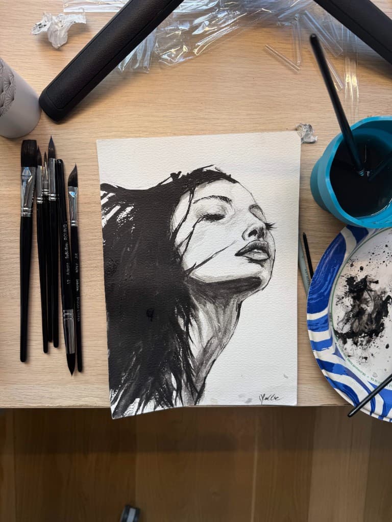 Ink wash portrait. Painted by Maddie.