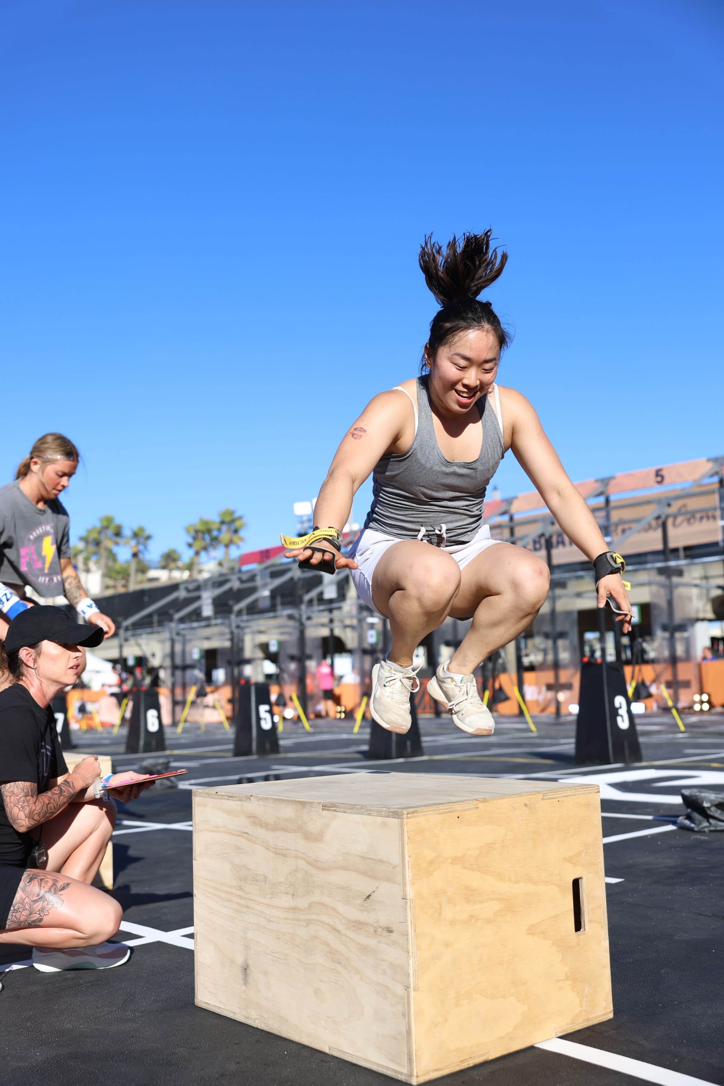 Maddie Wang doing box jumps at Crossfit