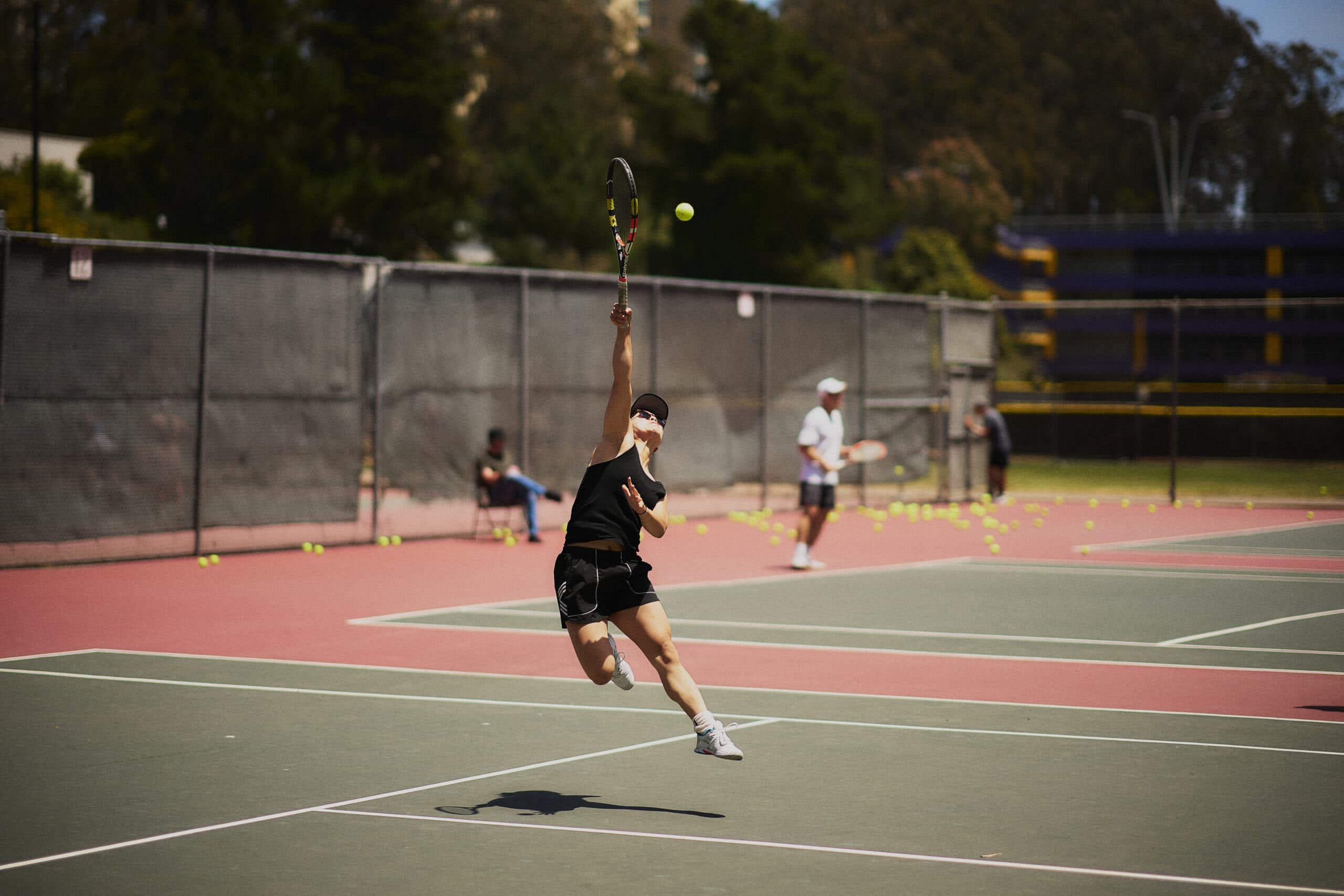 Maddie Wang playing tennis